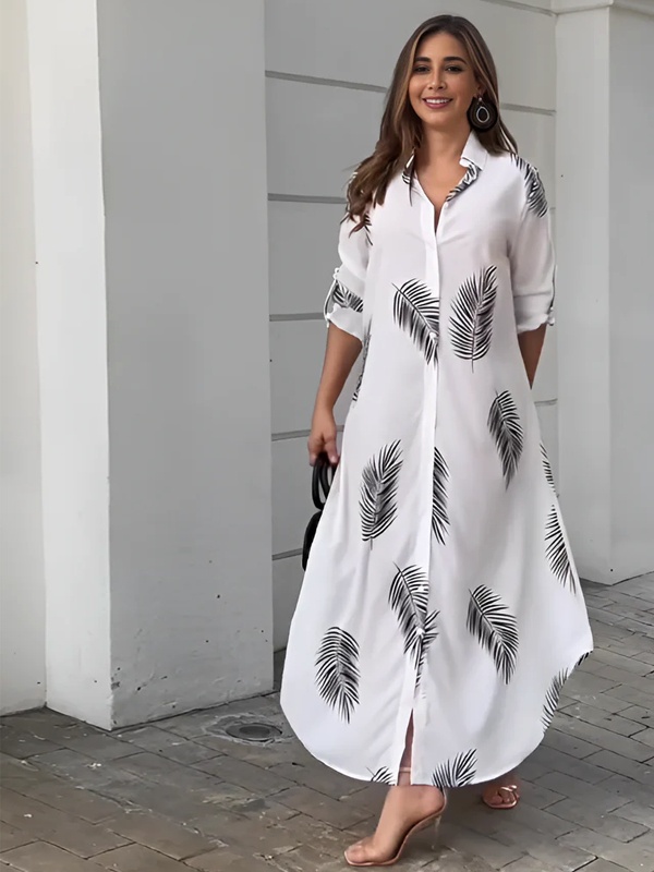 White collared maxi shirt dress with artistic black leaf botanical prints and button front