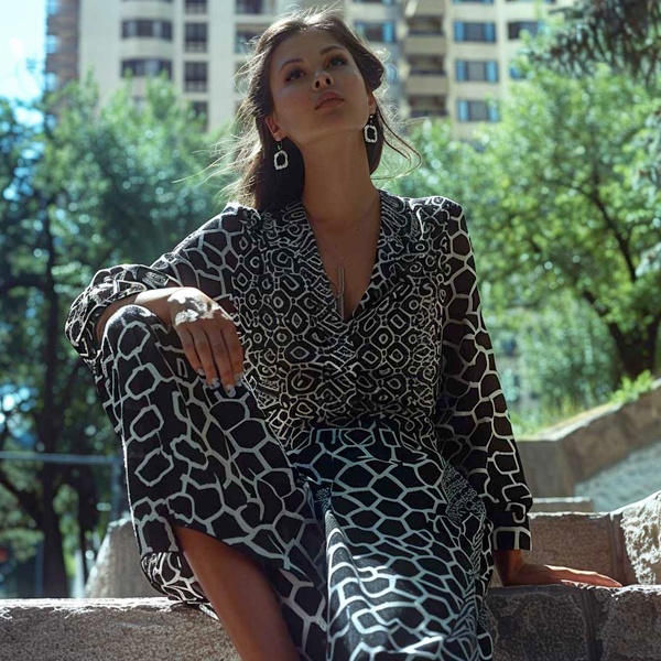 Historical black and white fashion from 19th century European couture featuring Art Deco style evening gown