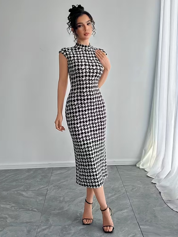 Classic black and white houndstooth print sleeveless bodycon midi dress with round neckline