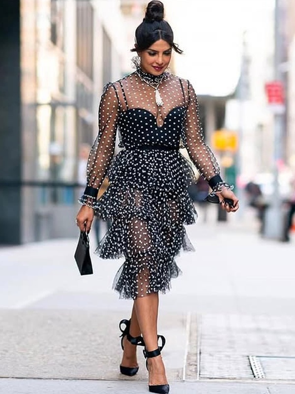 Priyanka Chopra in black polka dot dress with sheer net overlay and bralette style spaghetti strap top