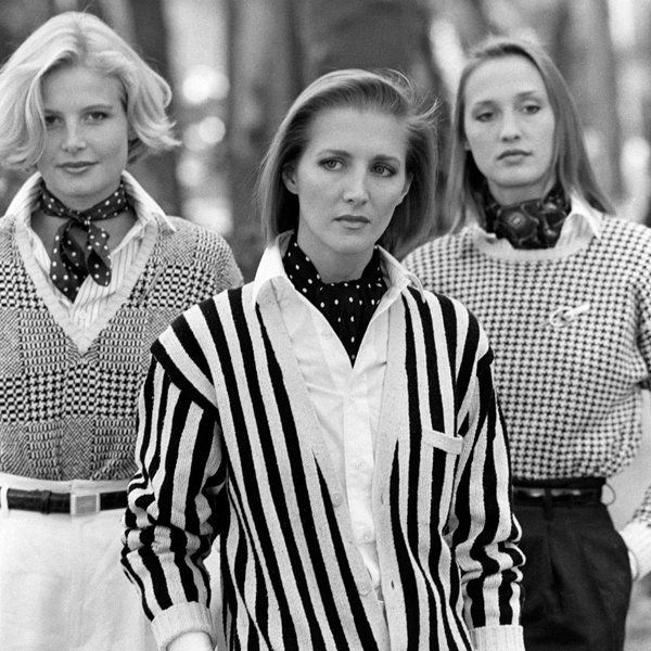 1960s Mod fashion revival featuring geometric black and white color block dress with bold stripes