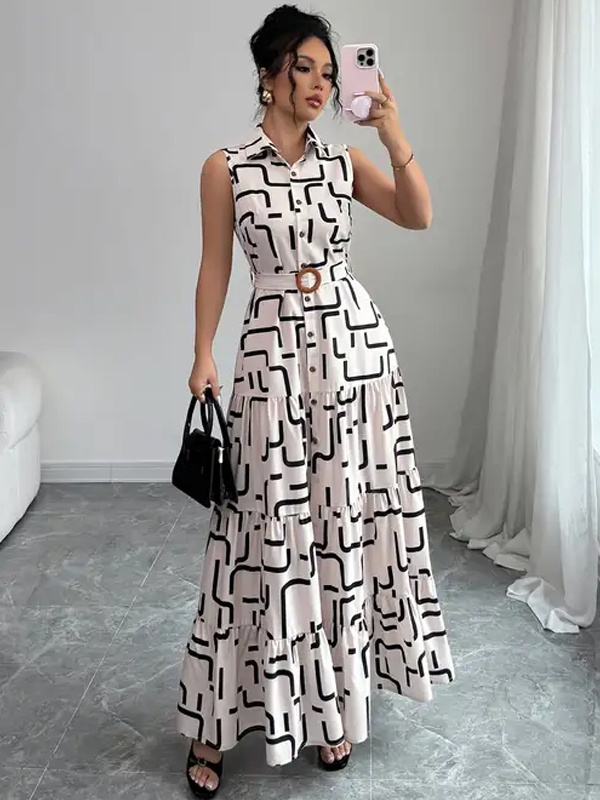Sleeveless black and white geometric print maxi dress with collar neckline and cinched belt waist