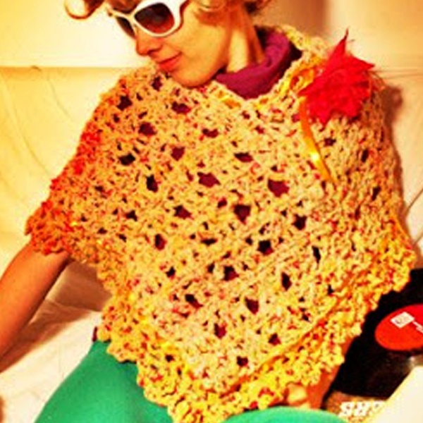 Chilean fashion designer Alexandra Guerrero modeling stylish eco-friendly clothing created from discarded recycled cigarette materials Chilean fashion designer Alexandra Guerrero modeling stylish eco-friendly clothing created from discarded recycled cigarette materials