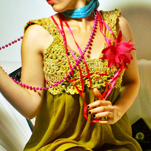 Sustainable clothing garments made from processed yarns derived from recycled cigarette butt fibers showing textile innovation Sustainable clothing garments made from processed yarns derived from recycled cigarette butt fibers showing textile innovation