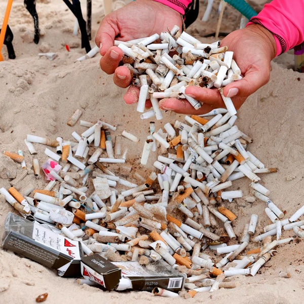 Step-by-step process showing how cigarette butts are cleaned sterilized and transformed into sustainable fashion textiles