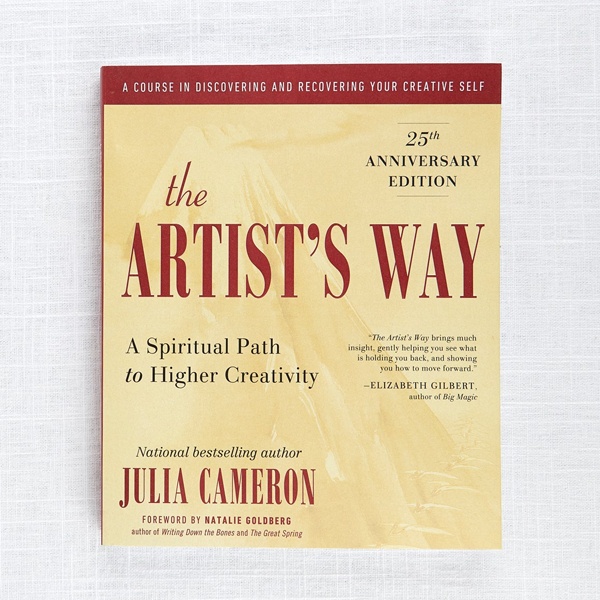 Julia Cameron's 'The Artist's Way' book displaying creative recovery exercises for fashion designers