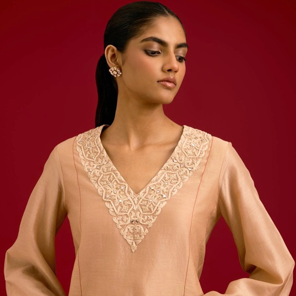 Beige Chanderi silk kurta with soft resham embroidery for elegant Diwali styling Beige Chanderi silk kurta with soft resham embroidery for elegant Diwali styling