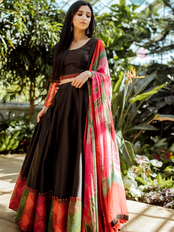 Black embroidered lehenga with vibrant printed dupatta for contemporary Diwali look Black embroidered lehenga with vibrant printed dupatta for contemporary Diwali look