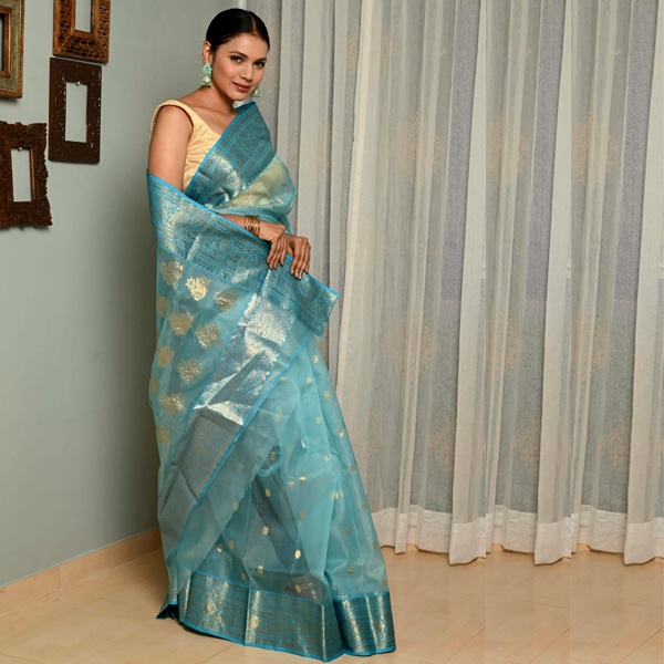 Sky blue pure Chanderi silk saree with soft sheen for comfortable Diwali celebration Sky blue pure Chanderi silk saree with soft sheen for comfortable Diwali celebration