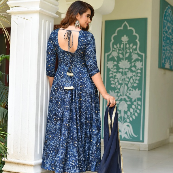 Ancient Indian Bandhani resist-dyeing technique becoming global tie-dye trend in mid-1960's discovered by Western hippies symbolizing counterculture freedom connecting sacred Indian craftsmanship to modern fashion