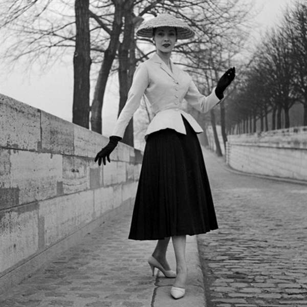 Historical fashion influences Christian Dior New Look 1947 post-WWII optimism 1970's bohemian Eastern European Indian styles and 1960's Hawaiian tropical prints shaping regional cultural fashion movements Historical fashion influences Christian Dior New Look 1947 post-WWII optimism 1970's bohemian Eastern European Indian styles and 1960's Hawaiian tropical prints shaping regional cultural fashion movements