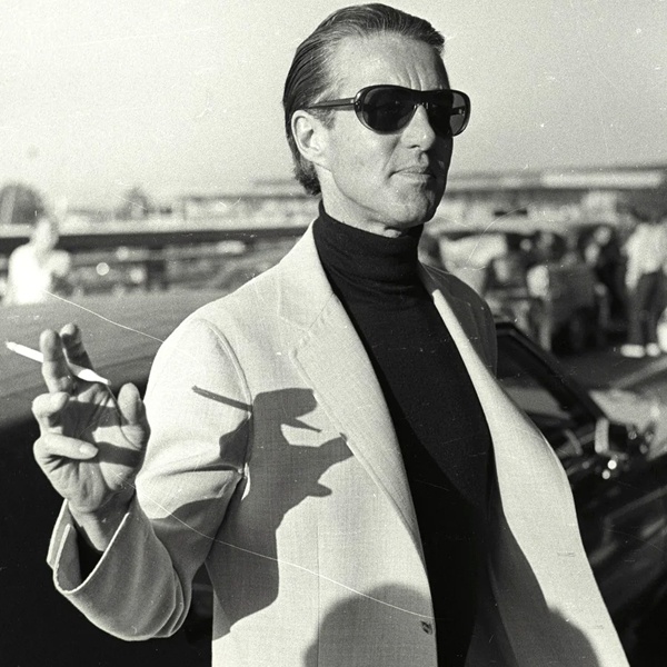 Roy Halston Frowick 1970's fashion icon creating effortless American luxury through minimalist designs pure elegant lines soft jumpsuits and layered garments dressing Jackie Kennedy and Liza Minnelli Roy Halston Frowick 1970's fashion icon creating effortless American luxury through minimalist designs pure elegant lines soft jumpsuits and layered garments dressing Jackie Kennedy and Liza Minnelli