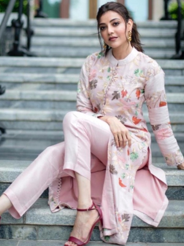 Kajal Aggarwal wearing modern front slit ethnic kurta with colorful floral prints for Indo-Western fashion