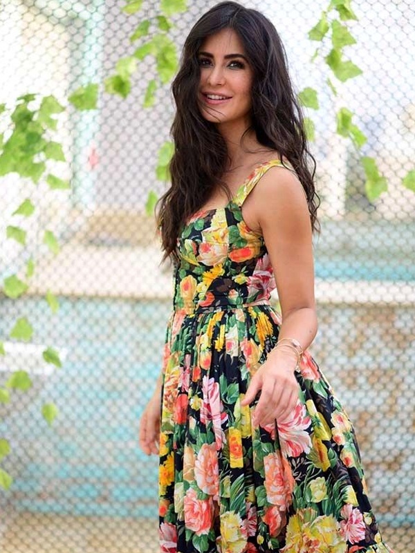 Bollywood actress Katrina Kaif wearing vibrant multicolor floral print sleeveless dress for celebrity fashion inspiration