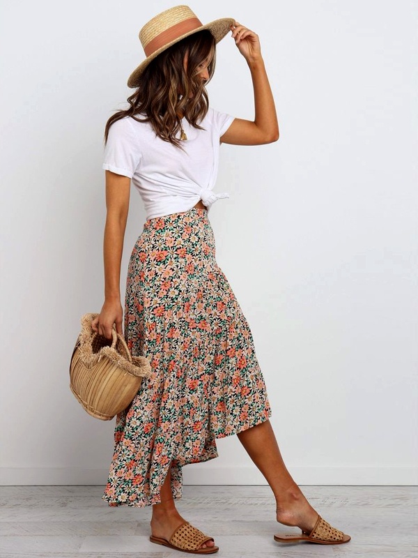Multicolor daisy floral print skirt with asymmetric uneven hem in below-knee length for playful fashion