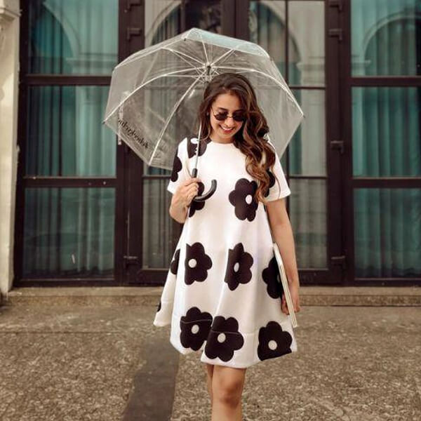 Women's monsoon wear featuring water resistant quick drying polyester and nylon fabrics with lightweight raincoats for comfortable rainy weather dressing