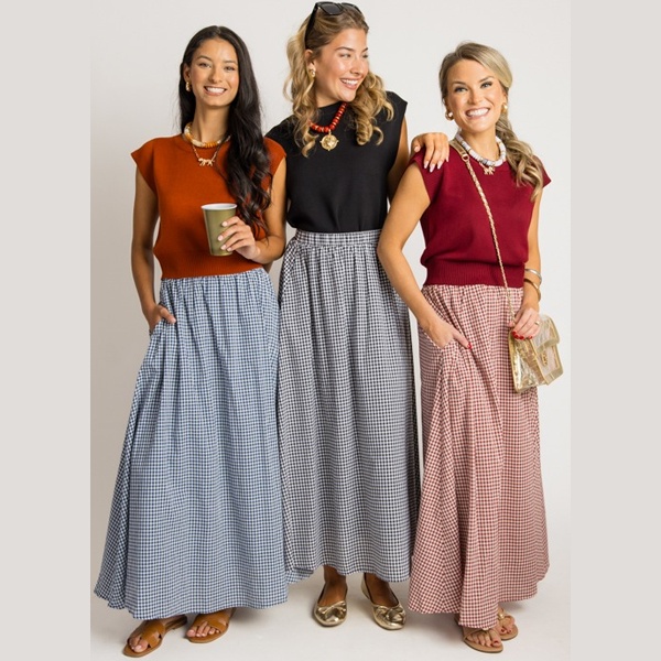 Girls wearing a checkered gingham maxi skirt with styling accessories for a complete 2025 fashion look