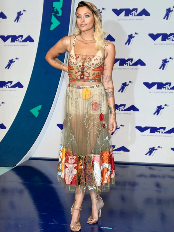 Paris Jackson at MTV VMAs in Christian Dior sheer embroidered bohemian slip dress with intricate beadwork and strappy heels showcasing modern hippie elegance Paris Jackson at MTV VMAs in Christian Dior sheer embroidered bohemian slip dress with intricate beadwork and strappy heels showcasing modern hippie elegance