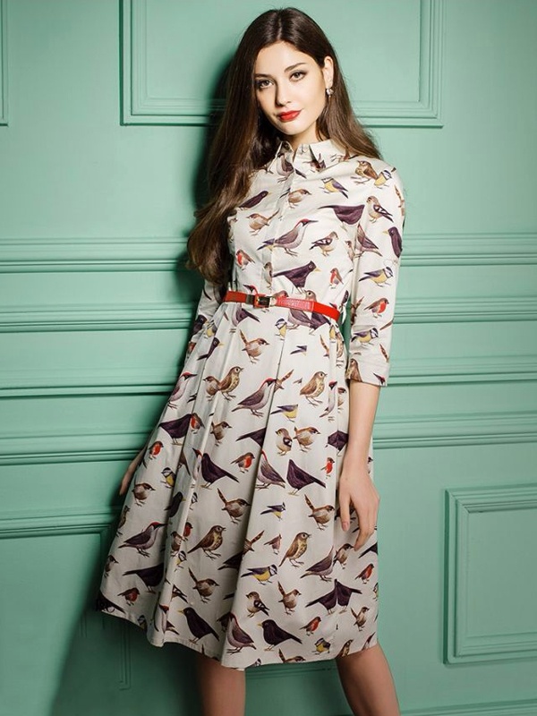 Dress featuring Indian fauna motifs including birds elephants and peacocks
