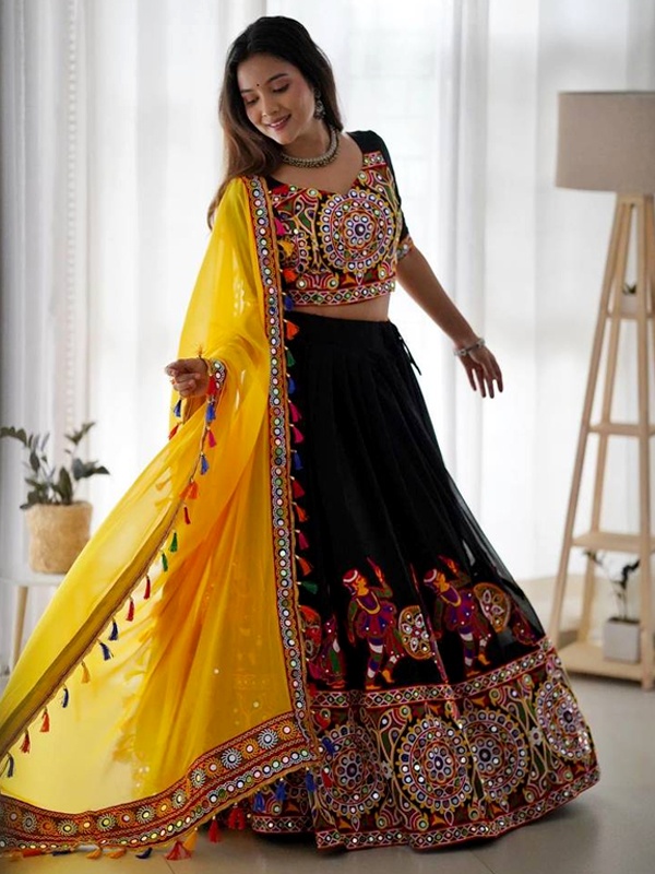 Kutch embroidery with mirror work outfit from Gujarat showing traditional reflective motifs