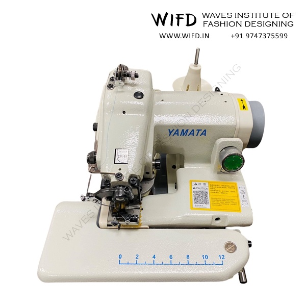 Blind hem industrial sewing machine with curved needle for creating invisible hems on pants, skirts and garments in professional tailoring