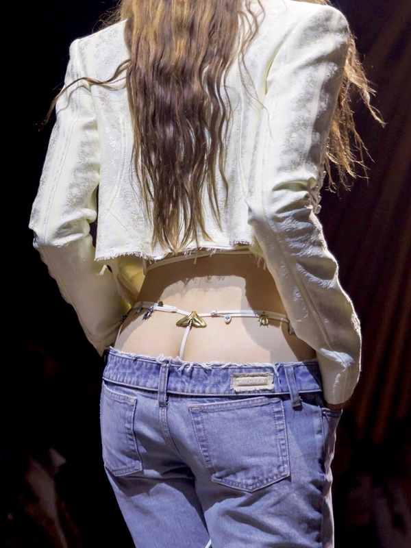 Bumster ultra low rise jeans from 90s fashion trend with extremely low waistband