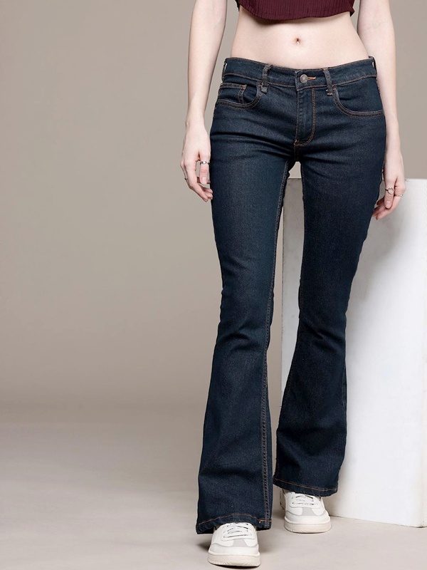 Low rise hip hugger jeans sitting below natural waist for relaxed youthful style