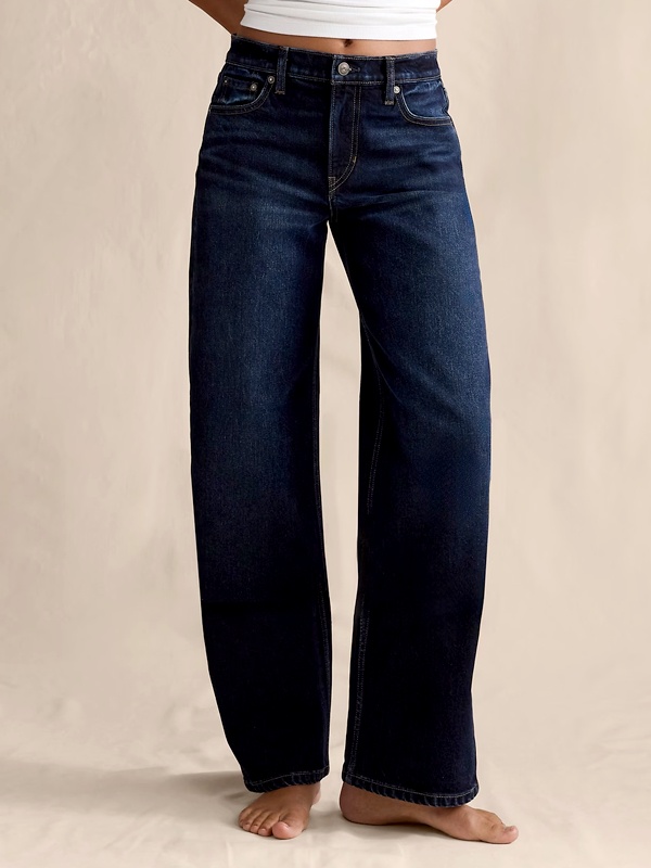 Mid rise jeans at natural waistline offering balanced comfort and coverage
