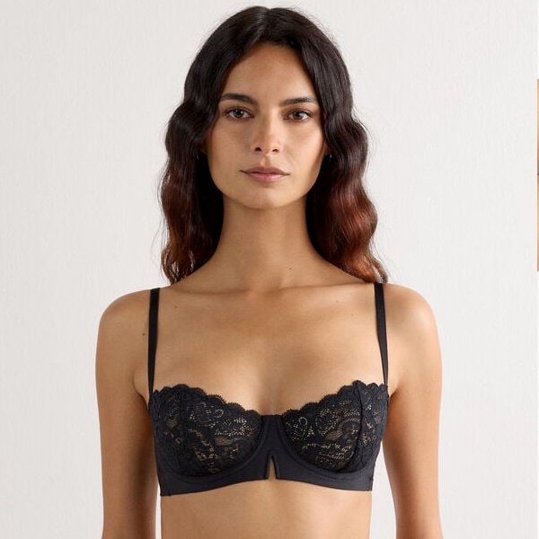 Balconette bra with wide-set straps and open neckline providing soft lift for low-cut tops