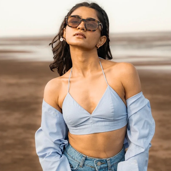 Bralette worn as top offering soft support without wiring - relaxed casual fashion styling piece