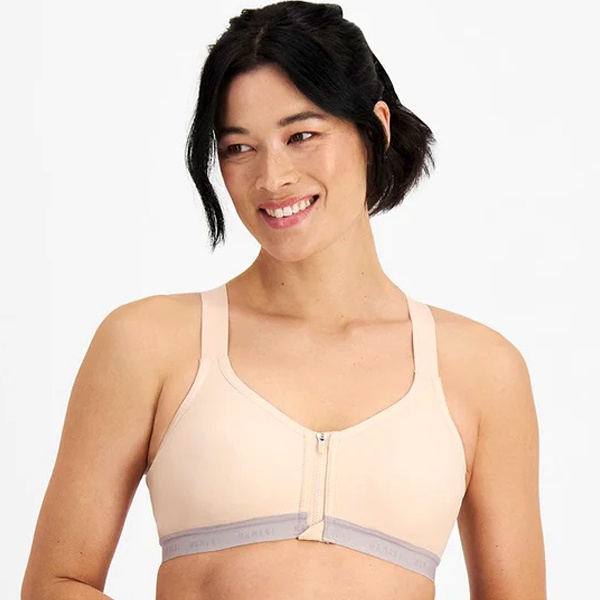 Post-surgery recovery bra with soft lining and smooth seams protecting sensitive areas during healing