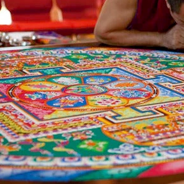 Colored sand mandala art used in Tibetan Buddhist floor designs and festivals Colored sand mandala art used in Tibetan Buddhist floor designs and festivals