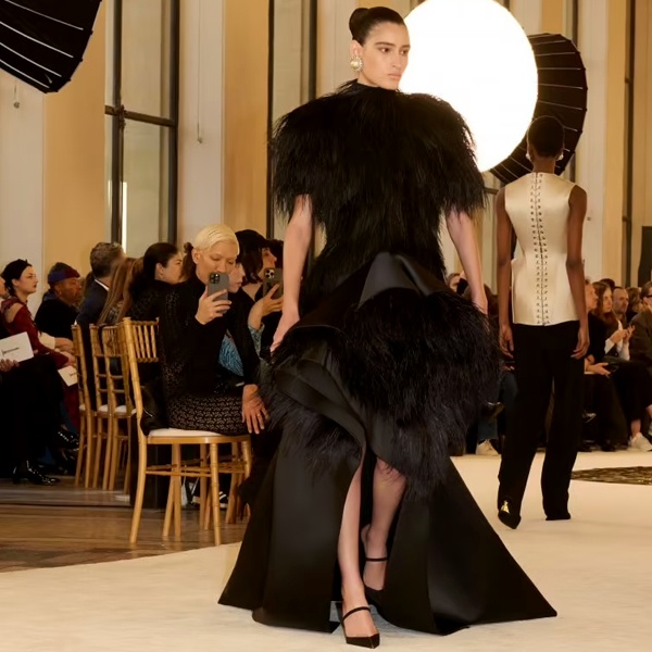 Haute couture fashion segment featuring handcrafted luxury garments and custom-made designer clothing for ultra-wealthy clients Haute couture fashion segment featuring handcrafted luxury garments and custom-made designer clothing for ultra-wealthy clients