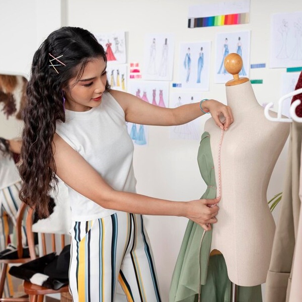 Fashion designer using sketching illustration demonstrating essential technical skills required for success