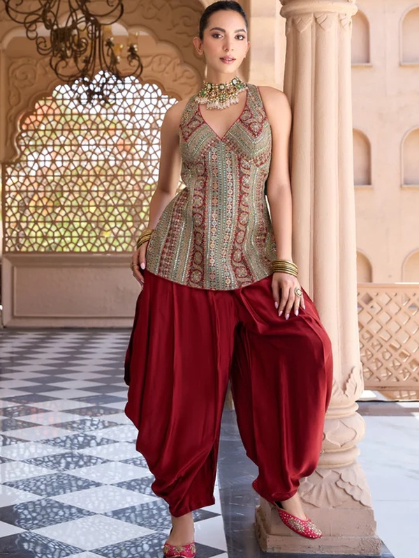Red silk embroidered dhoti-style pants with sleeveless embellished top modern fusion ethnic outfit Red silk embroidered dhoti-style pants with sleeveless embellished top modern fusion ethnic outfit