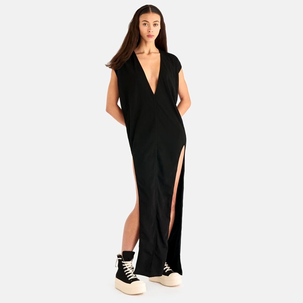 Black layered monochrome outfit showing dramatic textures by Rick Owens and Ann Demeulemeester