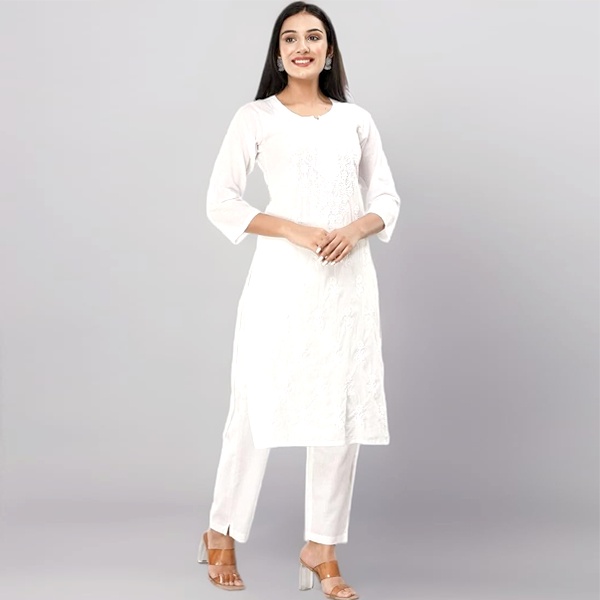 White kurta with tone on tone thread embroidery illustrating subtle surface treatment