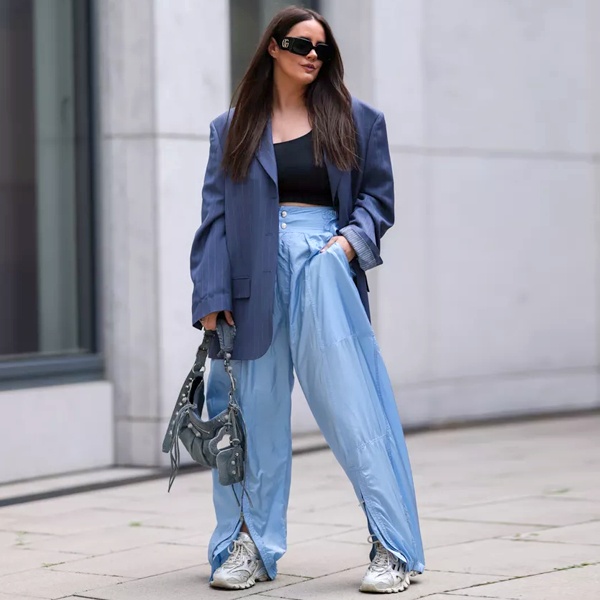 Modern parachute pants making fashion comeback in 2024-2025 college trends featuring comfortable lightweight nylon design for students