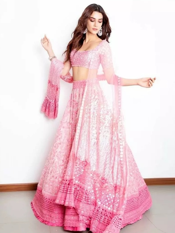 Kriti Sanon sparkles in this stunning baby pink sequinned lehenga.