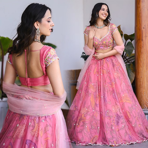Pink organza lehenga with traditional Kalamkari hand-painted art for wedding celebrations