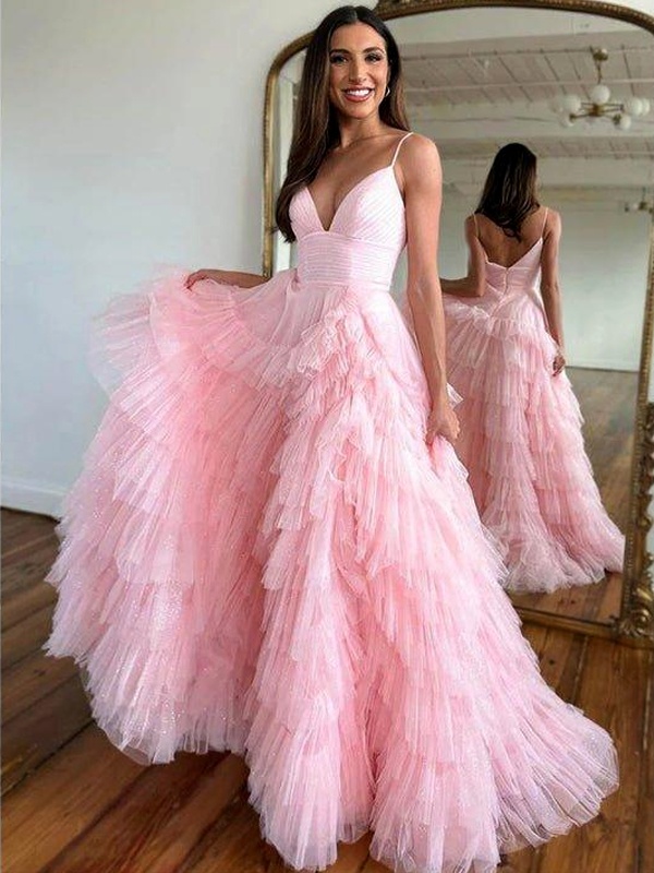 Pink tulle gown with cascading ruffled layers and V-neckline for formal occasions