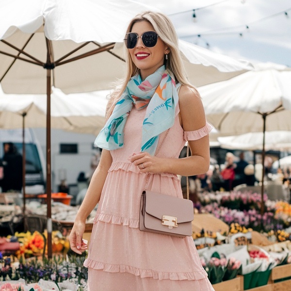 Small accessories like scarves, sunglasses and hats adding personality to pink outfits