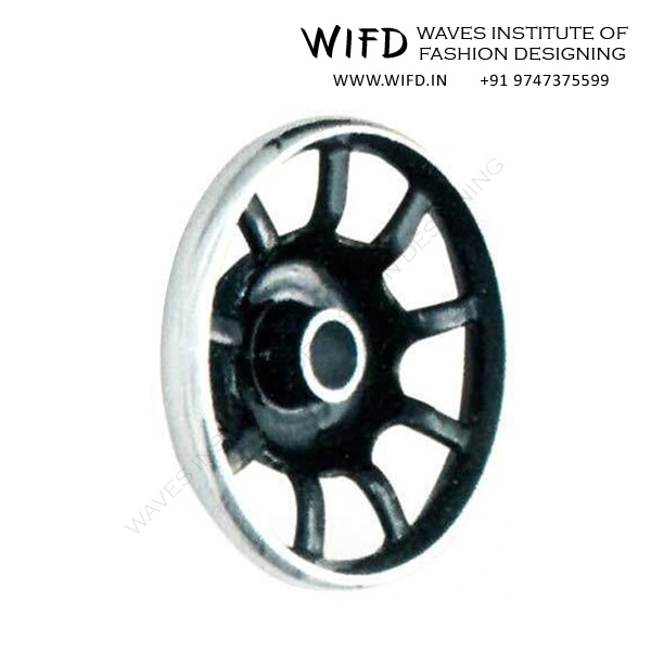Balance wheel or hand wheel on right side of sewing machine for manual needle control