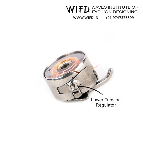 Lower tension regulator spring on bobbin case controlling thread release