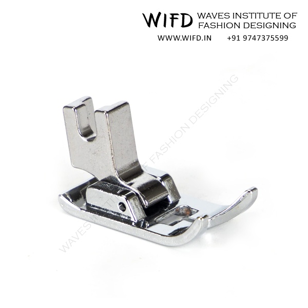 Presser foot holding fabric flat against throat plate during stitching