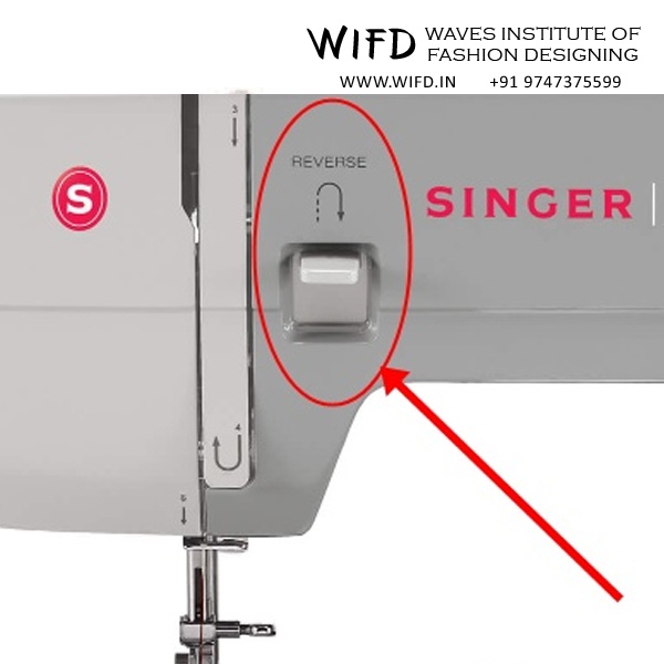 Reverse sewing lever for backward stitching to lock seams securely