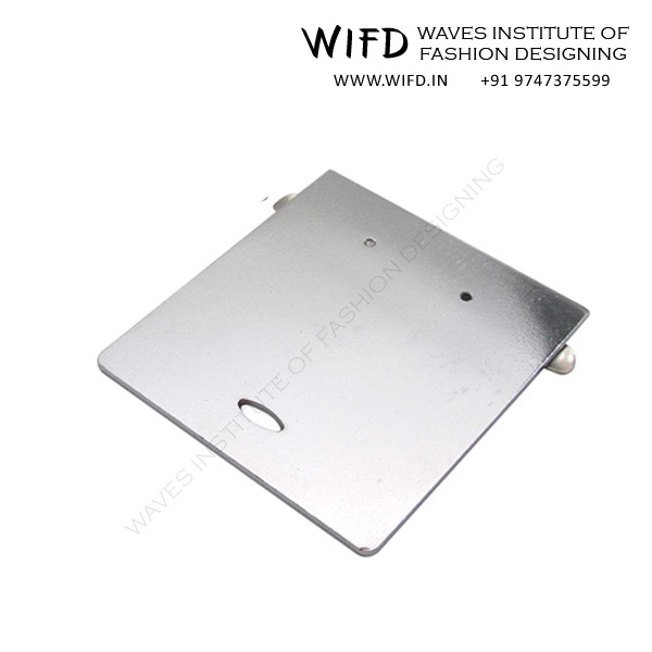 Sliding plate covering bobbin area for easy bobbin insertion and removal