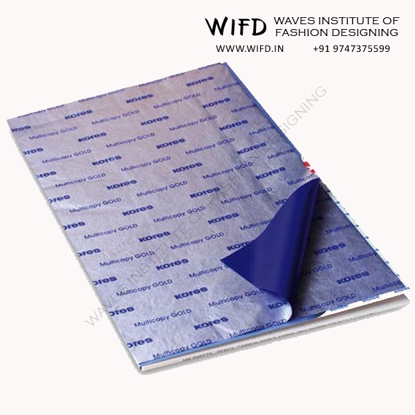 Tailor's carbon paper coated with colored wax for transferring pattern markings to fabric with tracing wheel