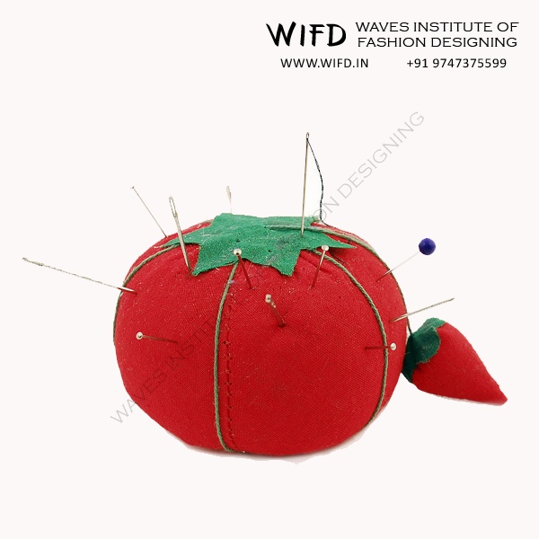Sharp fine sewing pins with wool or cotton-filled pin cushion for holding fabric pieces during construction