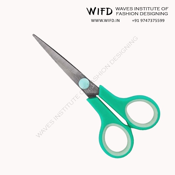 Lightweight sewing scissors with straight slender blades designed for cutting and trimming delicate fabrics